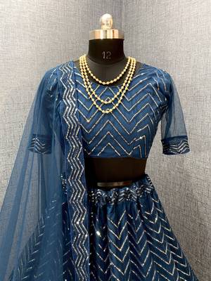 Teal embroidered net  lehenga 3