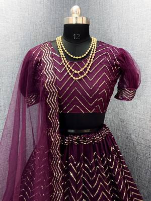 Wine embroidered net semi stitched lehenga 3