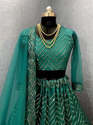 Green embroidered net  lehenga 3