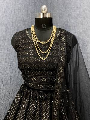 Black embroidered net semi stitched lehenga 2