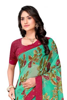 Turquoise printed brasso saree with blouse 4