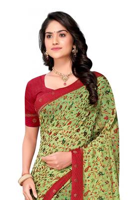 Light green printed brasso saree with blouse 4