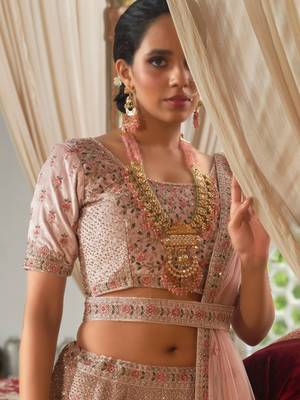 Peach embroidered velvet unstitched lehenga 2