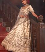 Off-white embroidered silk unstitched lehenga