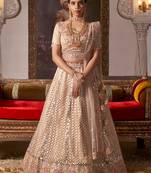 Peach embroidered net unstitched lehenga