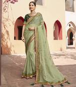 Olive embroidered organza saree with blouse