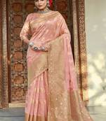 Light pink woven organza saree with blouse