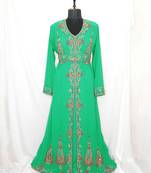 Turquoise luxurious Moroccan KaftanWith Sun-proof hijab.