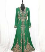 Dark Green Moroccan Kaftan With Sun-proof hijab.
