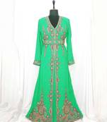 Turquoise luxurious Moroccan KaftanWith Sun-proof hijab.