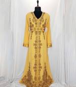 Yellow luxurious Moroccan Kaftan	With Sun-proof hijab.