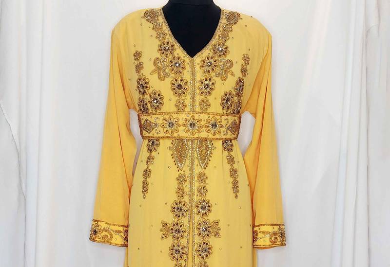 Yellow luxurious Moroccan Kaftan	With Sun-proof hijab.