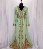 Light Green luxurious Moroccan Kaftan with Sun-proof hijab.