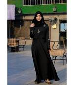 Black Abaya Like Dress With Floral Handwork Embellishments With A Matching Hijab