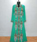 Turquoise luxurious Moroccan KaftanWith Sun-proof hijab.