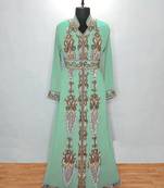 Light Green luxurious Moroccan Kaftan	With Sun-proof hijab.