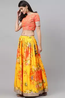 Engrossing Yellow Floral Designer Lehenga with rich embroidered Peach Blouse and Dupatta