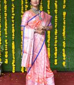 Pink woven banarasi silk saree with blouse