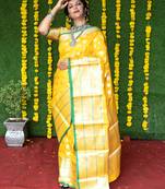 Yellow woven banarasi silk saree with blouse