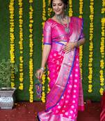 Rani pink woven banarasi silk saree with blouse