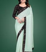 Green embroidered georgette saree with blouse
