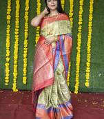 Green woven Faux kanchipuram silk saree with blouse