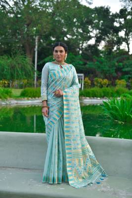 Teal woven raw silk saree with blouse 1