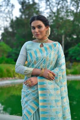 Teal woven raw silk saree with blouse 3