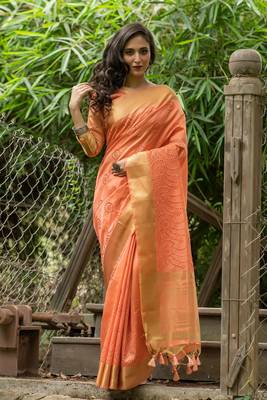 Orange woven linen saree with blouse 1