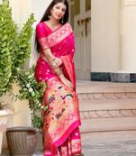 Pink woven banarasi silk saree with blouse