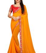 Yellow embroidered georgette saree with blouse