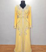 Yellow luxurious Moroccan Kaftan With Sun-proof hijab.