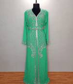 Turquoise luxurious Moroccan KaftanWith Sun-proof hijab.