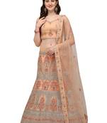 Peach embroidered net semi stitched lehenga