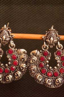 Silver onyx stone circular oxidised dangler drop carved studs earrings