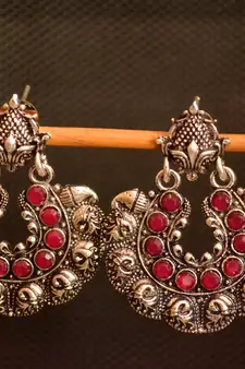 Silver onyx stone circular oxidised dangler drop carved studs earrings
