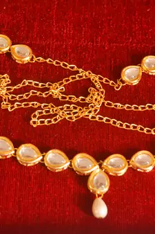 Gold waist-belt