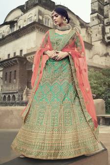 Green glitter dori, zari and thread embroidered with stone work satin semi stitched lehenga