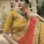 Yellow dori, zari and thread embroidered with stone work satin semi stitched lehenga