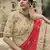 Beige dori, zari and thread embroidered with stone work satin semi stitched lehenga