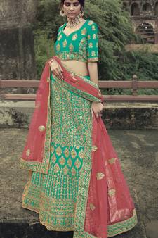 Green dori, zari and thread embroidered with stone work satin semi stitched lehenga