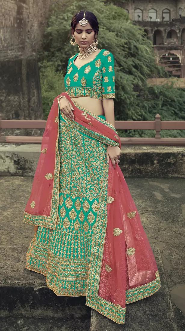 Green dori, zari and thread embroidered with stone work satin semi stitched lehenga