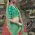 Green dori, zari and thread embroidered with stone work satin semi stitched lehenga