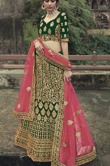 Dark Green Colored Dori Zari And Thread Embroidered With Stone Work Satin Lehenga For Wedding & Bride