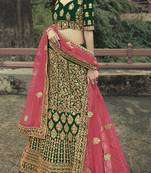 Dark Green Colored Dori Zari And Thread Embroidered With Stone Work Satin Lehenga For Wedding & Bride