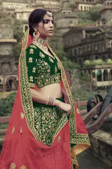 Dark Green Colored Dori Zari And Thread Embroidered With Stone Work Satin Lehenga For Wedding & Bride