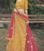 Yellow Colored Dori Zari And Thread Embroidered With Stone Work Satin Lehenga Choli For Wedding