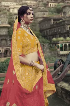 Yellow Colored Dori Zari And Thread Embroidered With Stone Work Satin Lehenga Choli For Wedding