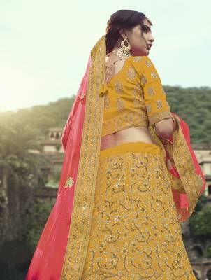 Yellow Colored Dori Zari And Thread Embroidered With Stone Work Satin Lehenga Choli For Wedding 3