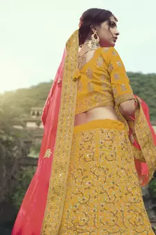 Yellow Colored Dori Zari And Thread Embroidered With Stone Work Satin Lehenga Choli For Wedding
